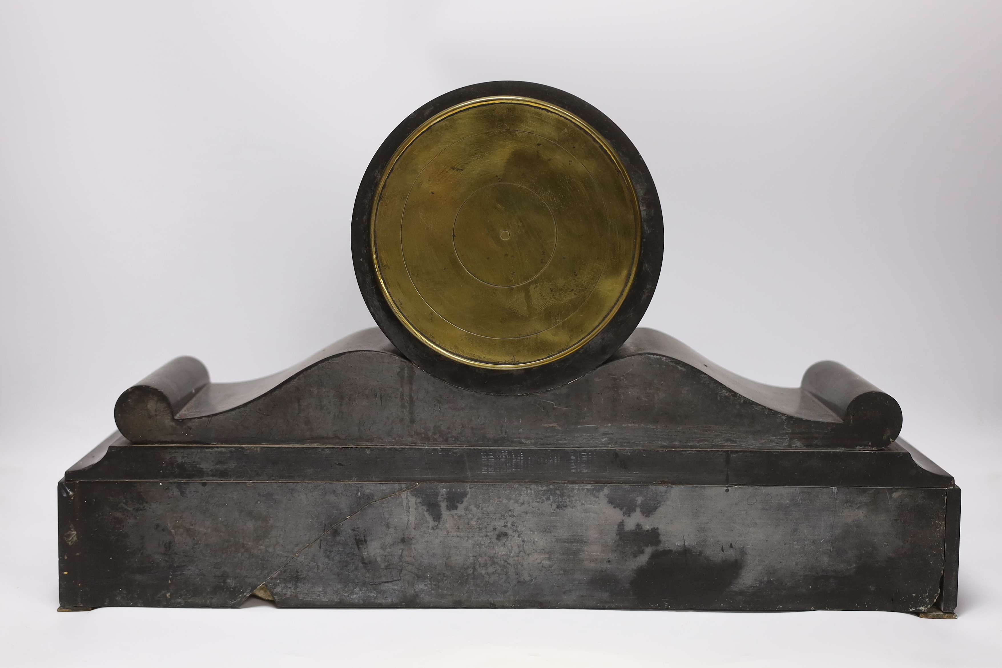 A 19th century French polished black slate mantel clock, 50cm wide